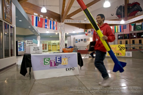 The first STEM EXPO Fair held at Edmonds School District's new STEM Magnet School at MountLake Terrace HS in Washington State. The student is caring a rocket, which was used in a group presentation at the fair.