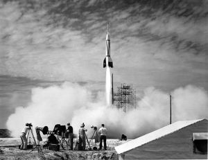 A modified V-2 rocket being launch on July 24, 1950. General Electric Company was prime contractor for the launch, Douglas Aircraft Company manufactured the second stage of the rocket & Jet Propulsion Laboratory (JPL) had major rocket design roles & test instrumentation. This was the first launch from Cape Canaveral, Florida.